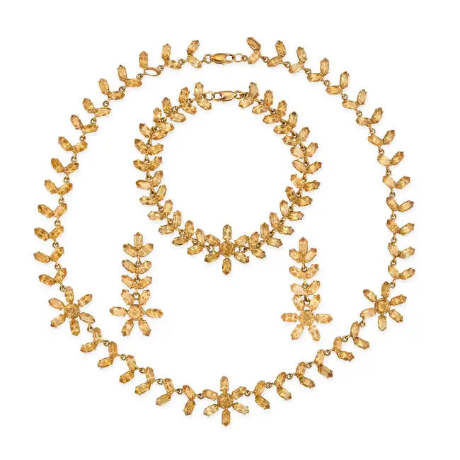 A CITRINE NECKLACE, BRACELET AND EARRINGS SUITE the foliate style necklace set throughout with