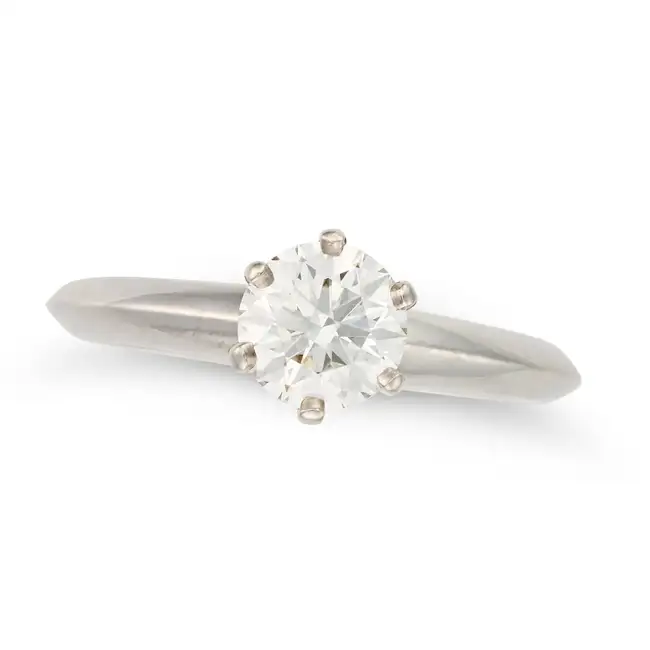 TIFFANY & CO., A 0.82 CARAT SOLITAIRE DIAMOND ENGAGEMENT RING in platinum, set with a round
