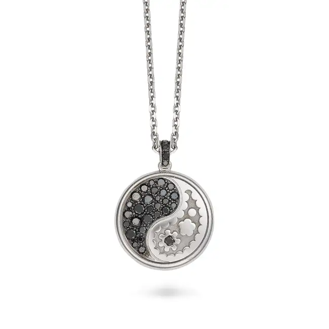 CARRERA Y CARRERA, A BLACK AND WHITE DIAMOND YIN AND YANG PENDANT NECKLACE the pendant designed as