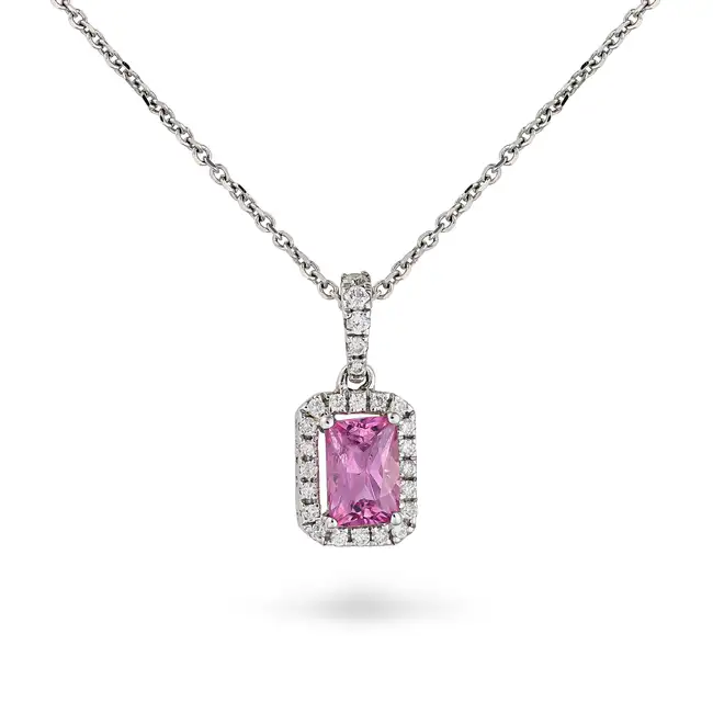 A PINK SAPPHIRE AND DIAMOND PENDANT NECKLACE the pendant set with a cushion cut pink sapphire of