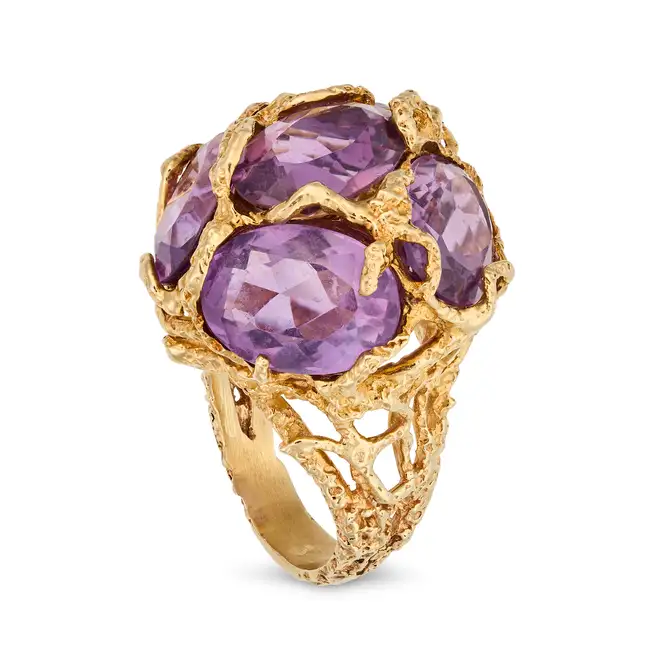 NO RESERVE - A MODERNIST AMETHYST DRESS RING in 14ct yellow gold, set with five oval cut amethysts