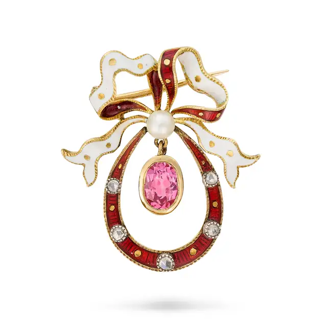 AN ANTIQUE PINK SAPPHIRE, DIAMOND, PEARL AND ENAMEL BOW BROOCH designed as a bow set with a pearl,