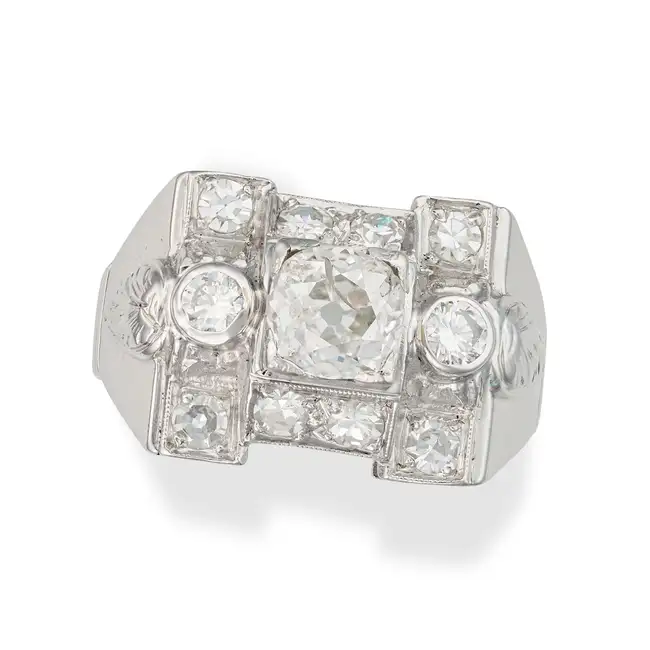 A RETRO DIAMOND DRESS RING set with a principal old cut diamond of approximately 1.00 carat,