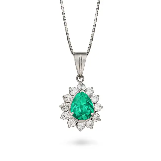 AN EMERALD AND DIAMOND PENDANT NECKLACE the pendant set with a pear cut emerald of 1.02 carats,