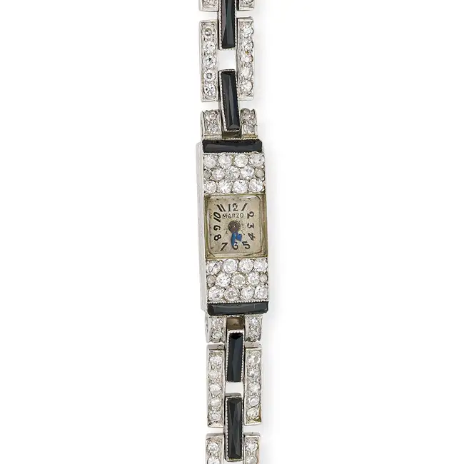 MARZO, A FINE ART DECO ONYX AND DIAMOND COCKTAIL WATCH the rectangular dial with Arabic numerals,