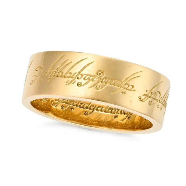 NO RESERVE - A LIMITED EDITION 'LORD OF THE RINGS' ONE RING in 18ct yellow gold, the band engraved
