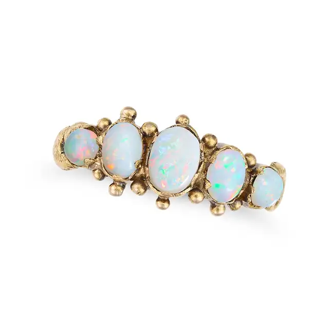 AN ANTIQUE OPAL FIVE STONE RING in 15ct yellow gold, set with five cabochon opals, full British