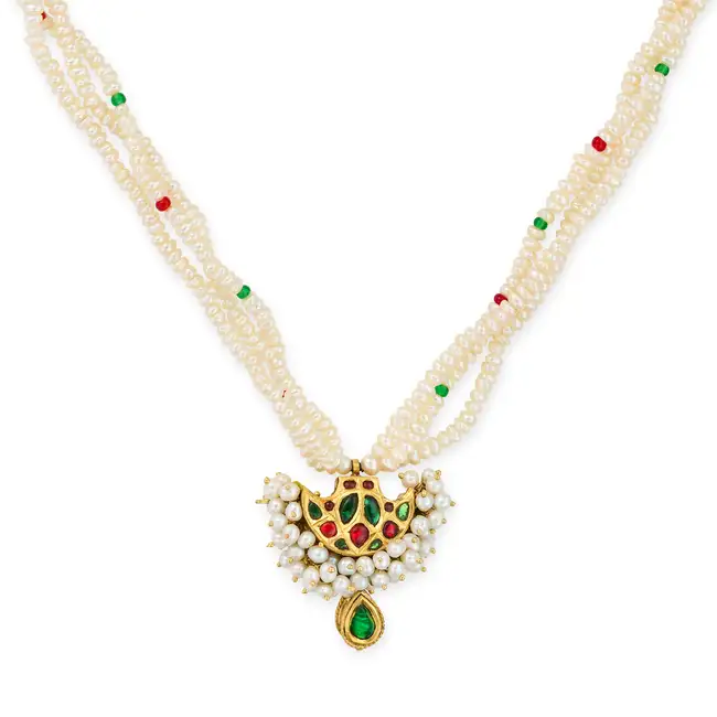 AN INDIAN PEARL PENDANT NECKLACE the pendant set with clusters of pearls and accented by red and