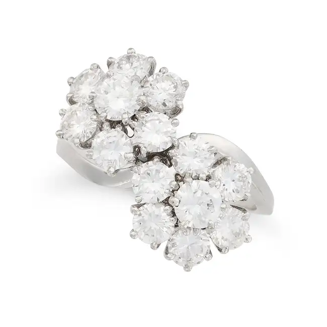 ANDRE VASSORT FOR VAN CLEEF & ARPELS, A DIAMOND FLEURETTE RING, 1960's in 18ct white gold, set