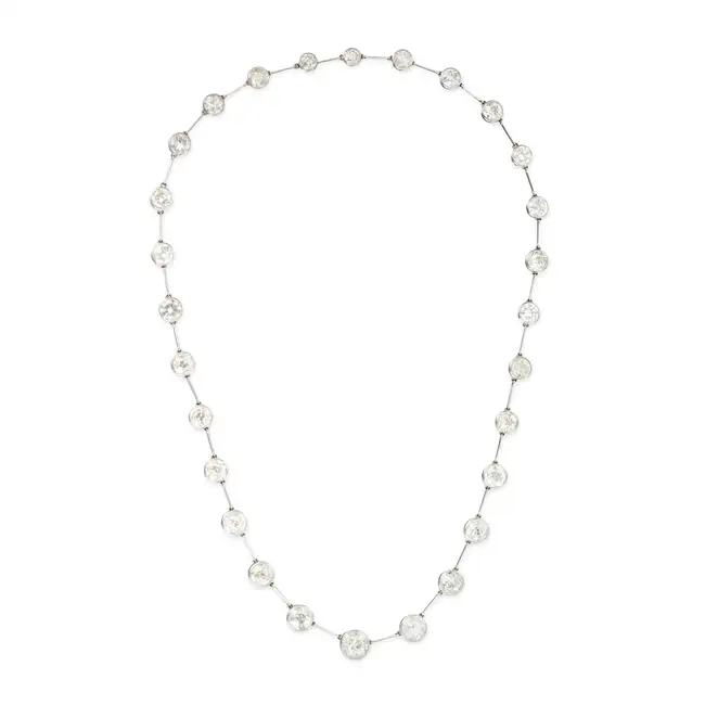 CHAUMET, A FINE ANTIQUE DIAMOND RIVIERE NECKLACE, EARLY 20TH CENTURY in platinum, comprising a row
