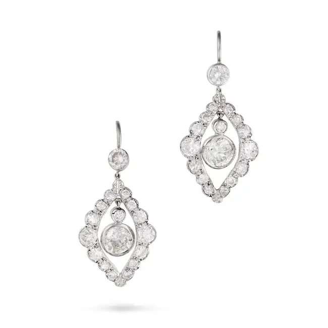 A PAIR OF DIAMOND DROP EARRINGS each suspending an old European cut diamond drop within a frame of