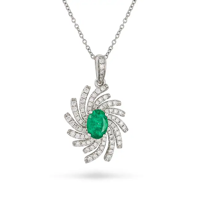 AN EMERALD AND DIAMOND PENDANT NECKLACE in 18ct white gold, the pendant set with an oval cut emerald