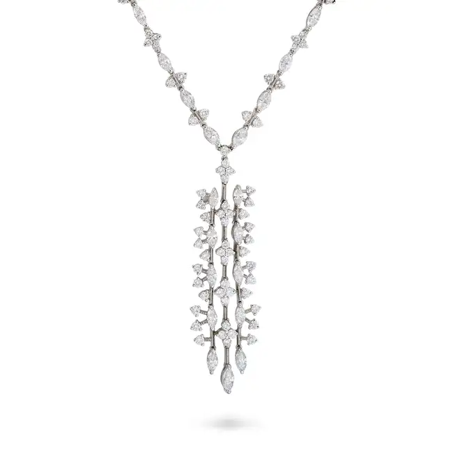 A DIAMOND PENDANT NECKLACE in 18ct white gold, set with marquise and round brilliant cut diamonds,