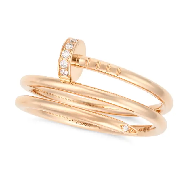 CARTIER, A DIAMOND JUSTE UN CLOU DOUBLE RING in 18ct rose gold, designed as a bent nail, accented by