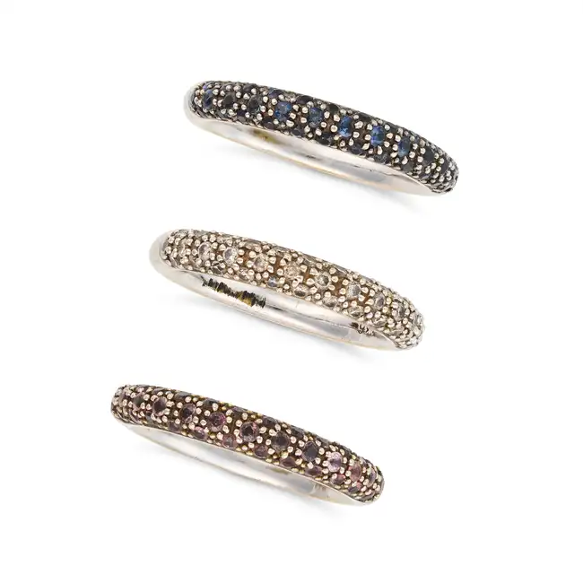 THREE GEM SET STACKING RINGS comprising three rings pave set with round cut diamonds, sapphires