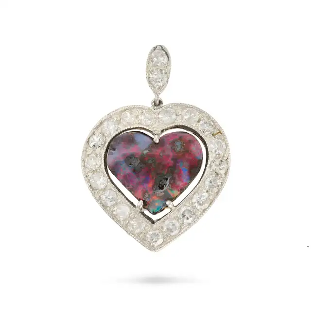 A BLACK OPAL AND DIAMOND HEART PENDANT the pendant designed as a heart set with a cabochon black