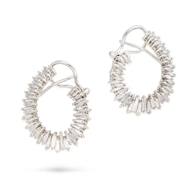 NO RESERVE - A PAIR OF DIAMOND HOOP EARRINGS each designed as a stylised hoop, set with baguette and