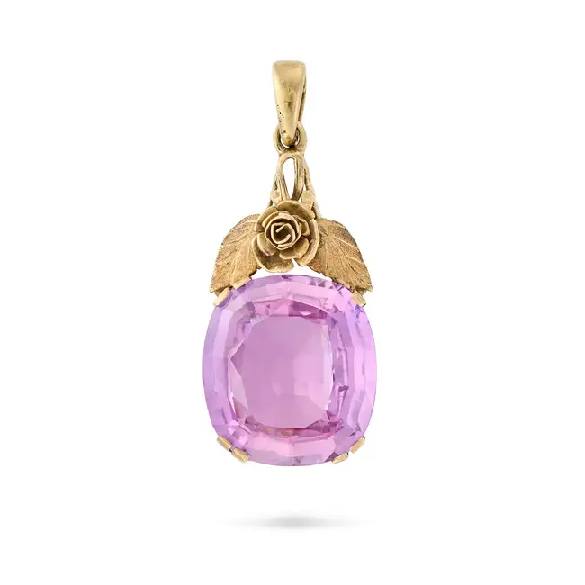A SYNTHETIC PURPLE SAPPHIRE PENDANT set with a synthetic purple sapphire of approximately 15.85