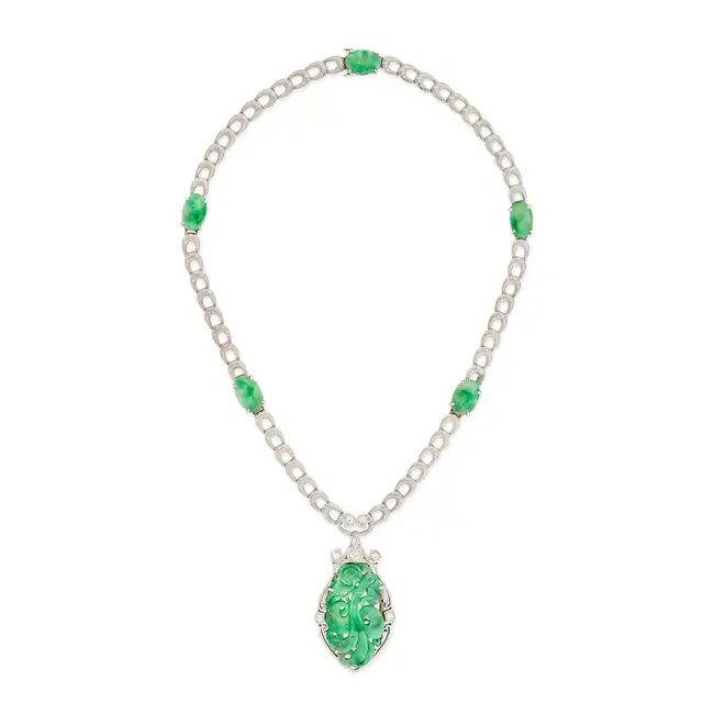 ALLSOPP & ALLSOPP, AN UNTREATED JADEITE JADE AND DIAMOND NECKLACE comprising a fancy engraved