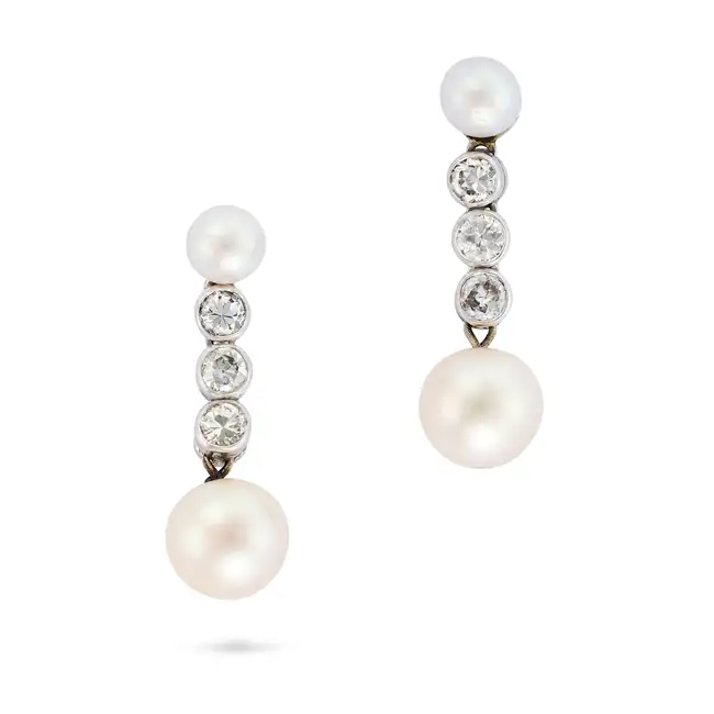 A PAIR OF PEARL AND DIAMOND DROP EARRINGS each comprising a pearl drop, suspended from a row of