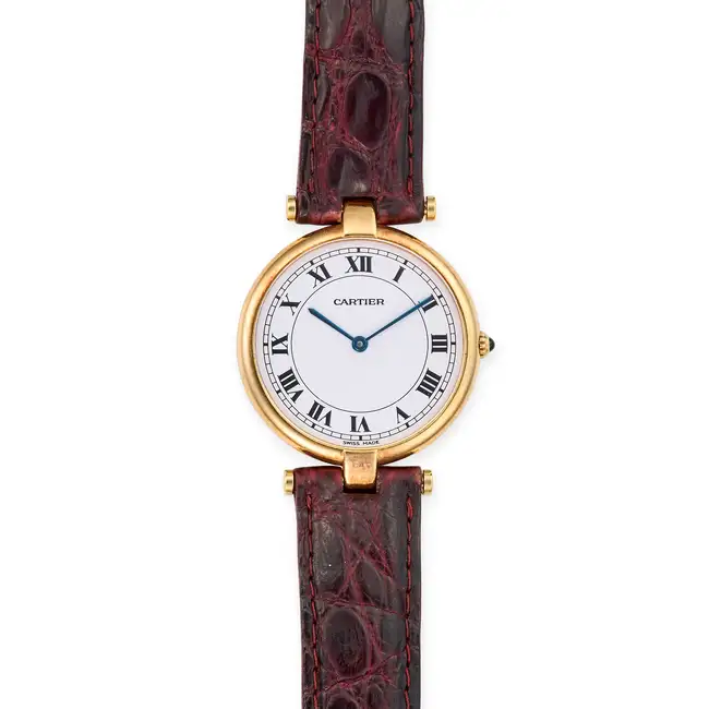 CARTIER, A VINTAGE VENDOME WRISTWATCH, in 18 carat yellow gold, the circular polished case with