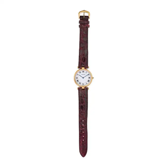 CARTIER, A VINTAGE VENDOME WRISTWATCH, in 18 carat yellow gold, the circular polished case with