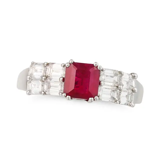 A RUBY AND DIAMOND RING in 18ct white gold, set with an octagonal step cut ruby of approximately 1.