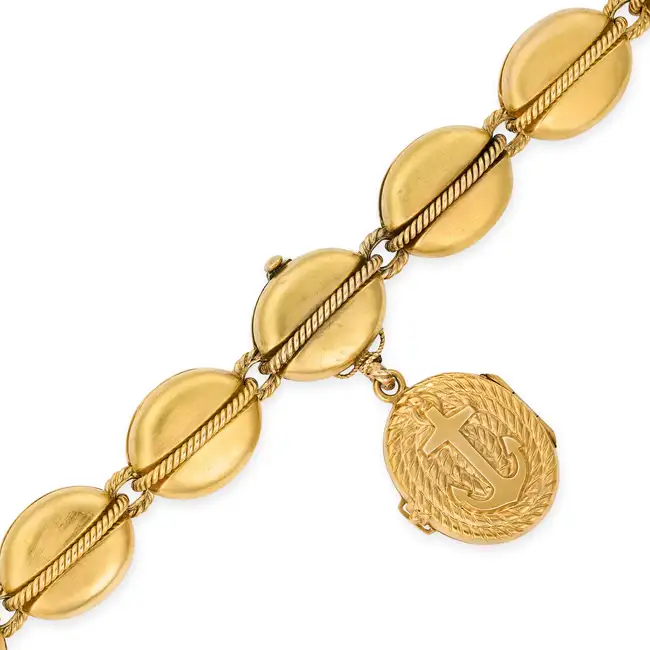 AN ANTIQUE VICTORIAN NAUTICAL BRACELET comprising a row of stylised links accented by twisted