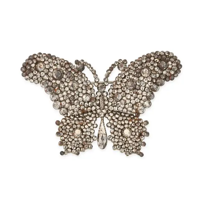 NO RESERVE - AN ANTIQUE CUT STEEL BUTTERFLY BROOCH designed as a butterfly set with cut steel studs,