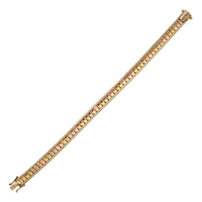 NO RESERVE - MAPPIN & WEBB, A VINTAGE GOLD BRACELET in 9ct yellow, white and rose gold, comprising a
