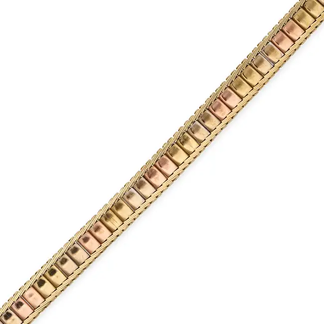 NO RESERVE - MAPPIN & WEBB, A VINTAGE GOLD BRACELET in 9ct yellow, white and rose gold, comprising a