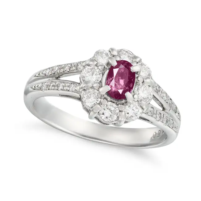 NO RESERVE - A BRAZILIAN ALEXANDRITE AND DIAMOND RING set with an oval cut alexandrite of 0.50