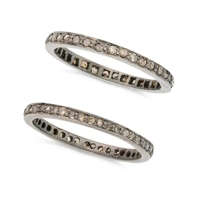 NO RESERVE - A PAIR OF DIAMOND STACKING RINGS each set all around with round cut diamonds, stamped