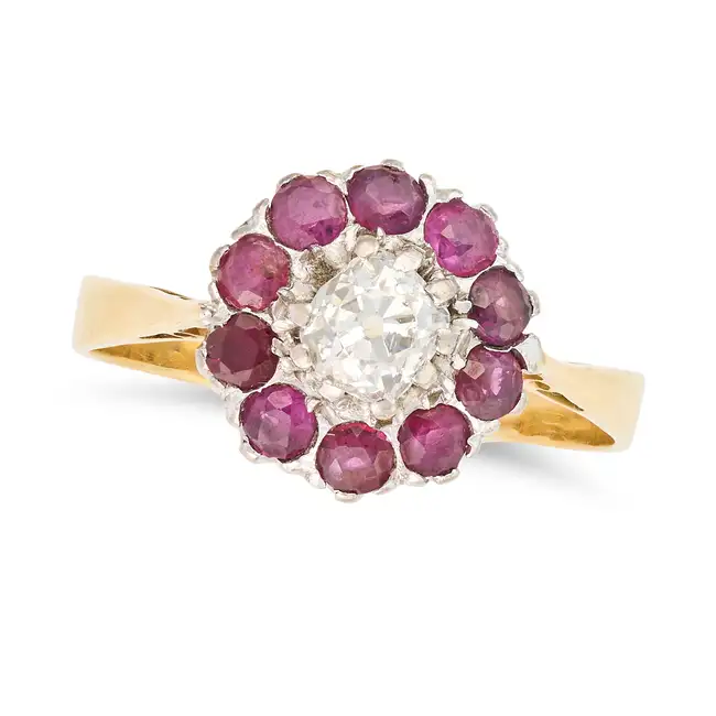 NO RESERVE - A VINTAGE DIAMOND AND RUBY CLUSTER RING in 18ct yellow gold, set with an old cut