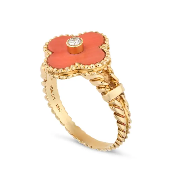 VAN CLEEF & ARPELS, A VINTAGE CORAL AND DIAMOND ALHAMBRA RING in 18ct yellow gold, comprising a