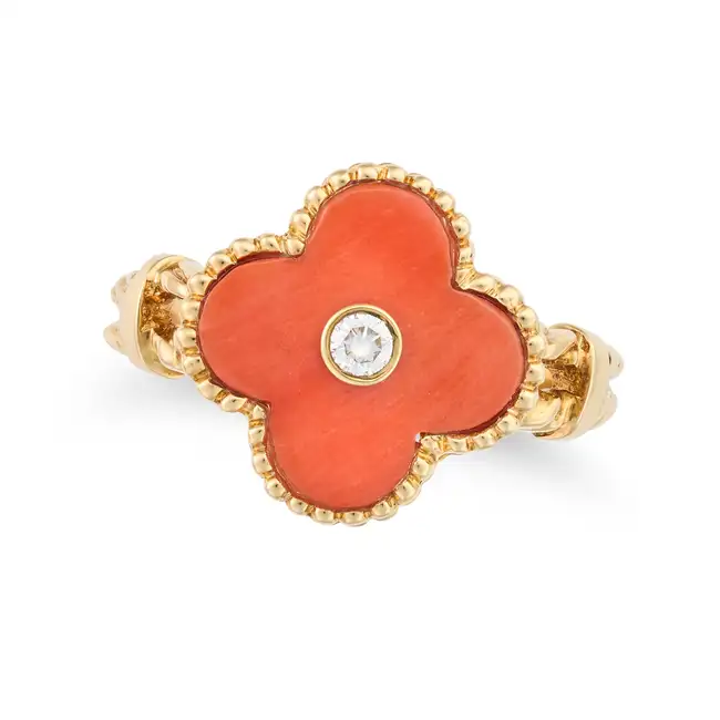 VAN CLEEF & ARPELS, A VINTAGE CORAL AND DIAMOND ALHAMBRA RING in 18ct yellow gold, comprising a