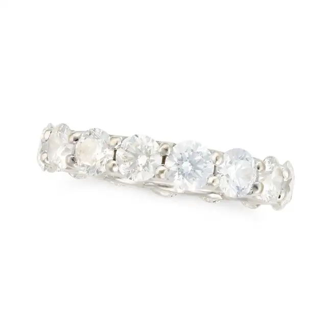 A FINE DIAMOND FULL ETERNITY RING set all around with a row of round brilliant cut diamonds