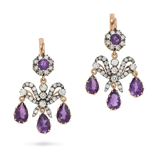 A PAIR OF FINE AMETHYST AND DIAMOND GIRANDOLE EARRINGS each designed as a bow set with old