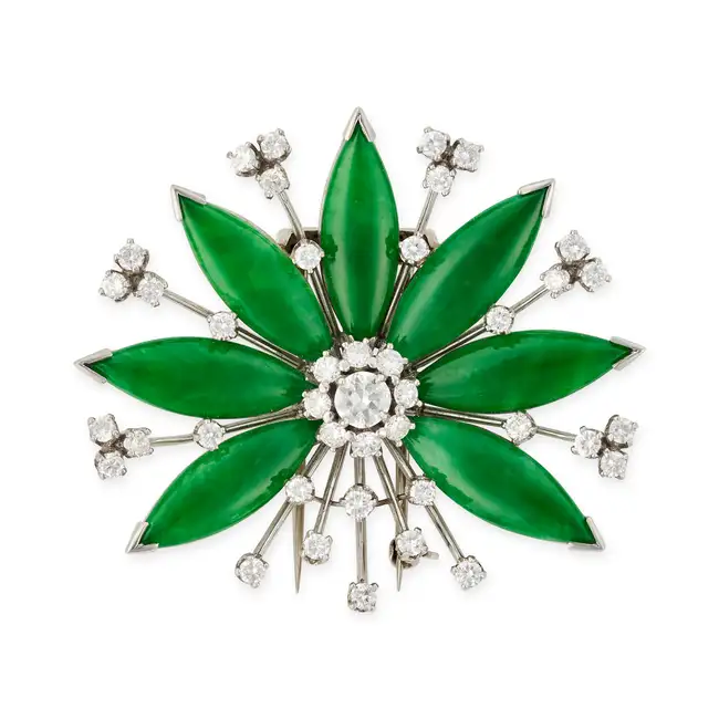 A FINE VINTAGE JADETE JADE AND DIAMOND FLOWER CLIP BROOCH designed as a flower head, set to the