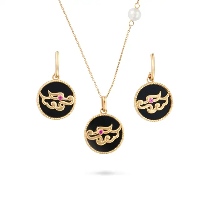 AN ONYX, RUBY AND PEARL DRAGON EARRINGS AND NECKLACE SUITE the pendant comprising a circular onyx