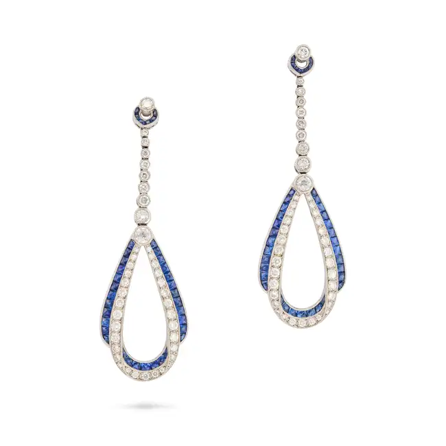 A PAIR OF SAPPHIRE AND DIAMOND DROP EARRINGS in 18ct white gold, each comprising a row of