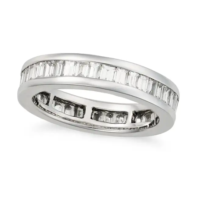 A DIAMOND FULL ETERNITY RING set all around with a row of baguette cut diamonds totalling 1.8-2.0