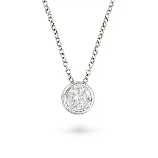 A 1.00 CARAT SOLITAIRE DIAMOND PENDANT NECKLACE in 18ct white gold, the pendant set with a round
