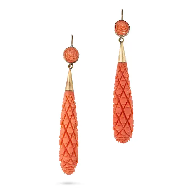 A PAIR OF ANTIQUE CARVED CORAL DROP EARRINGS, 19TH CENTURY each comprising a coral cameo carved to