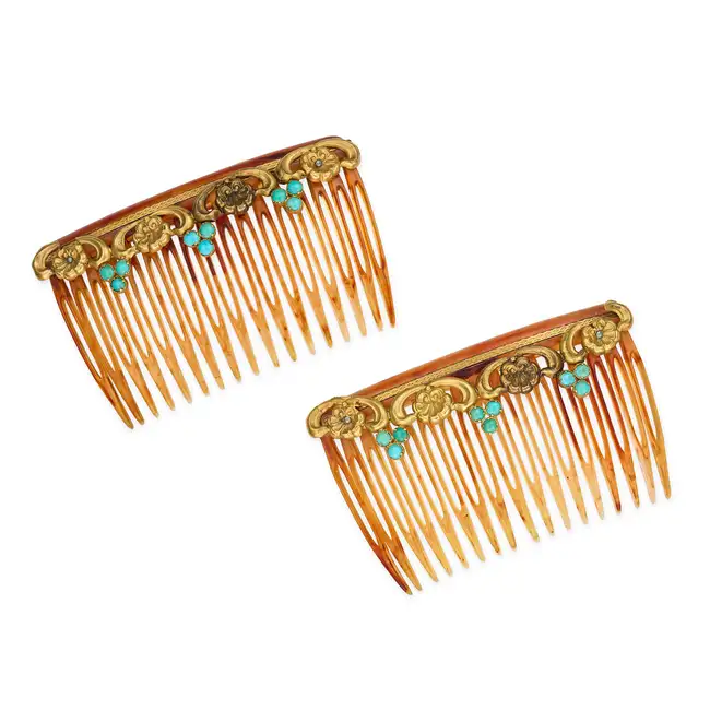 A PAIR OF ANTIQUE VICTORIAN TURQUOISE HAIR COMBS each in identical design, comprising a resin comb