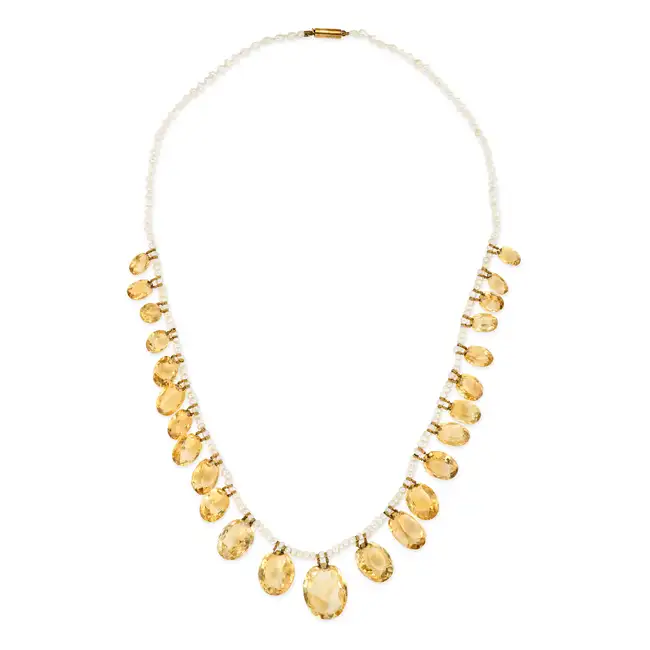 A CITRINE AND PEARL FRINGE NECKLACE comprising a single row of seed pearls, suspending a