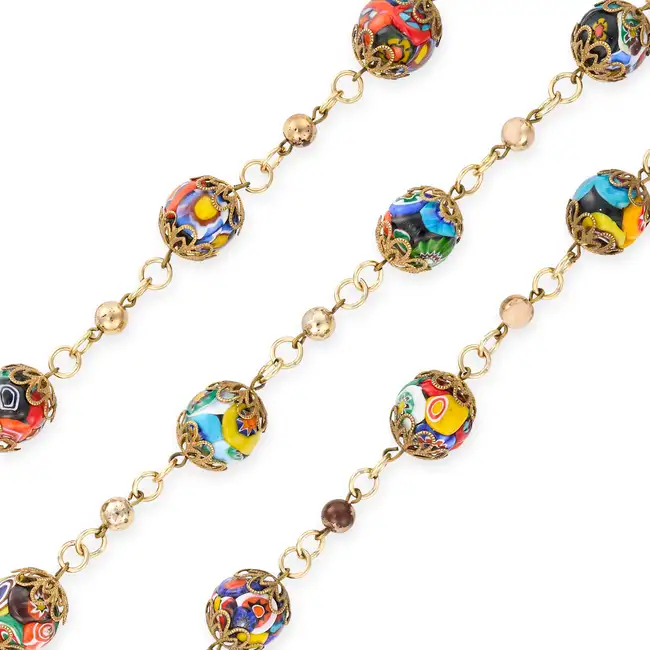 NO RESERVE - A VINTAGE VENETIAN GLASS BEAD NECKLACE comprising a row of coloured Venetian glass