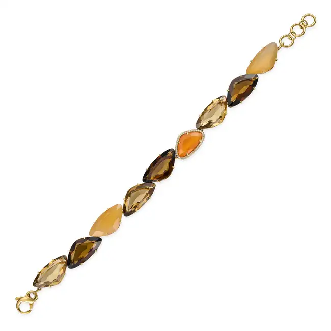 VIANNA, A SMOKY QUARTZ, CITRINE, CARNELIAN AND DIAMOND BRACELET comprising a row of mixed cut