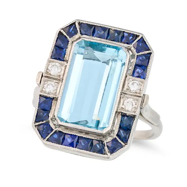 A FINE AQUAMARINE, SAPPHIRE AND DIAMOND DRESS RING set with an octagonal step cut aquamarine of