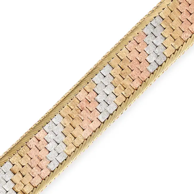 A TRICOLOUR GOLD BRACELET comprising rows of tricolour links with a brushed satin finish, accented